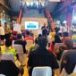 Pemimpin Cabang BRI KC Tanjung Duren Tri Ichsan Nur sedang menyampaikan Sosialisasi kepada padagang Pasar Tomang Barat atau Pasar Kopro