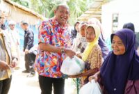 Dokumentasi Foto Kegiatan Pemberian Manfaat RTLH di Pasar Rawa Kecamatan Gebang 