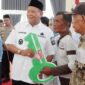 Dokumentasi Foto Kegiatan Bupati Langkat H.Syah Afandin Bersama BAZNAS Memberikan Rumah Baru kepada Masyarakat 
